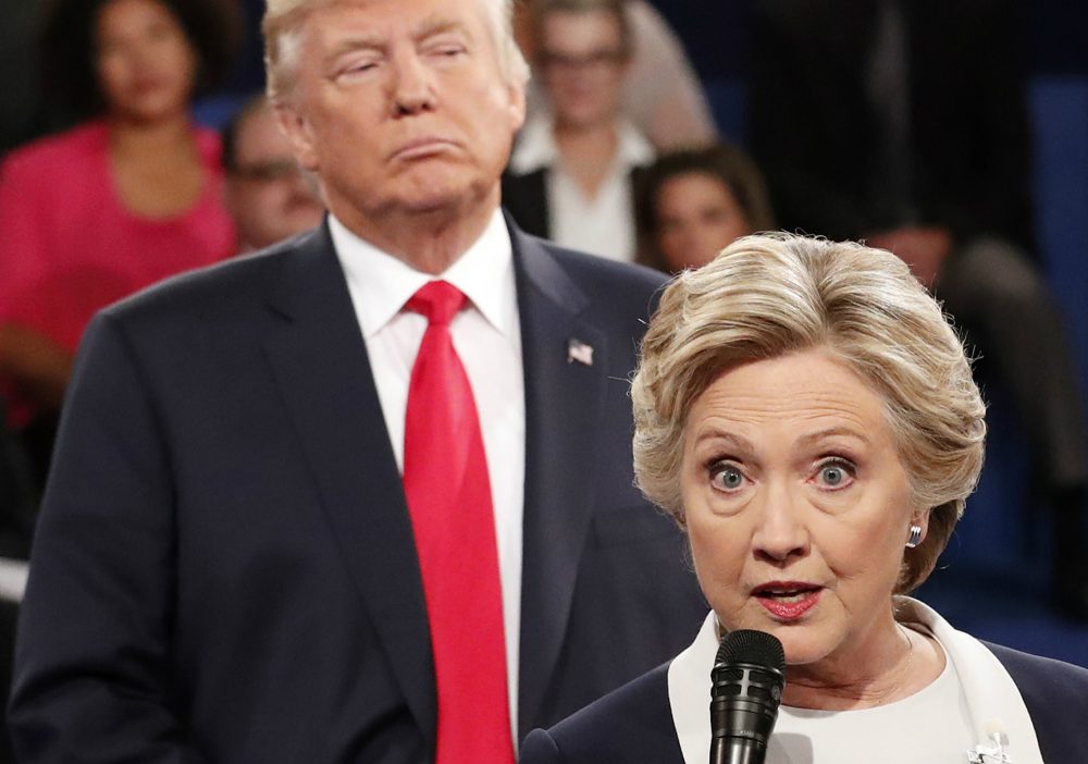 Democratic presidential nominee Hillary Clinton, right, speaks as Republican presidential nominee Donald Trump listens during the second presidential debate at Washington University in St. Louis, Sunday, Oct. 9, 2016. (Rick T. Wilking/AP)