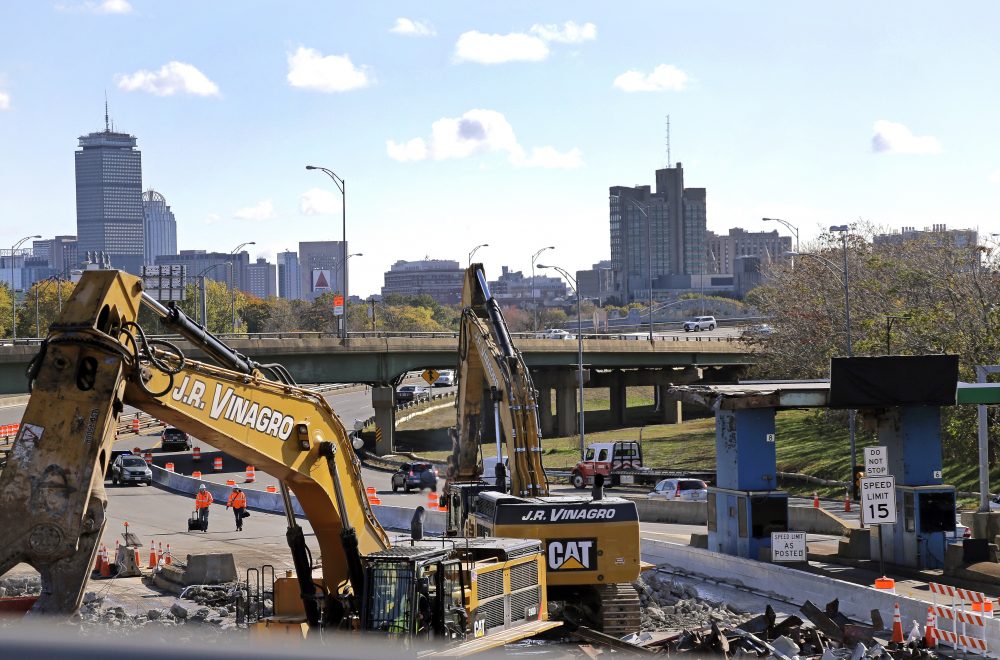 Tollbooths are dismantled as all-electronic tolling is underway on the Massachusetts Turnpike, Monday in Boston. (Elise Amendola/AP)