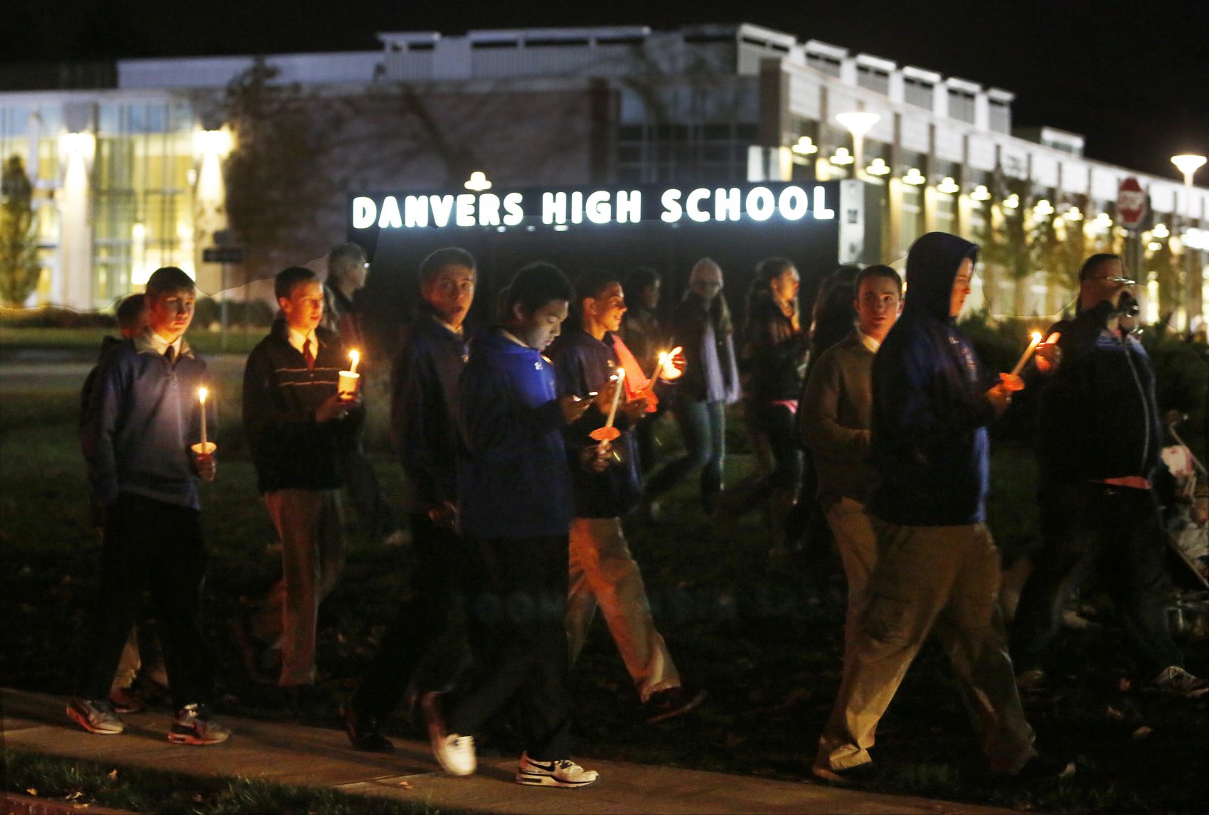 Danvers High School students hold a candlelight vigil to mourn the death of Colleen Ritzer, a 24-year-old math teacher, on Oct 23, 2013. (Bizuayehu Tesfaye/AP)
