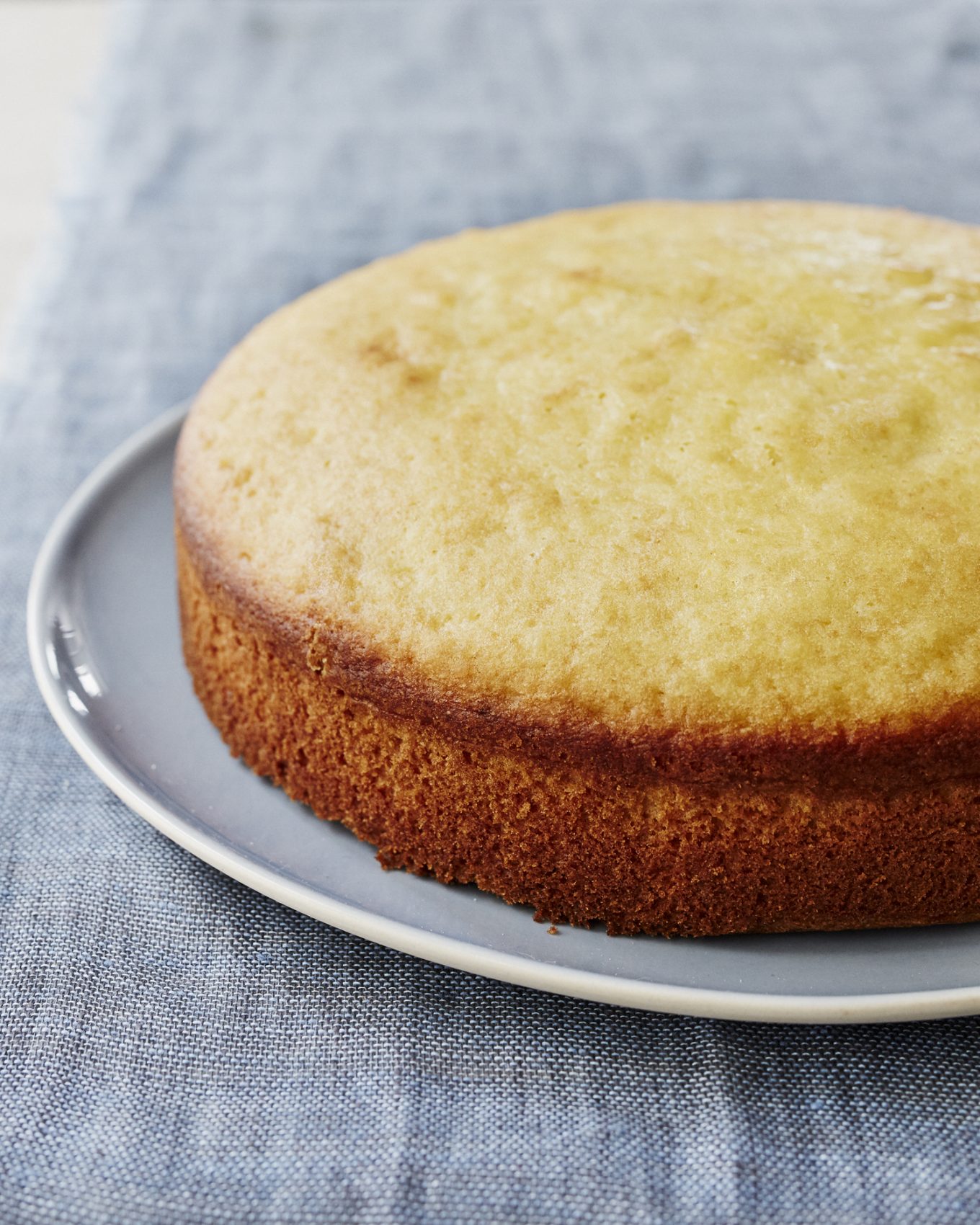 An olive oil cake, baked form Mark Bittman's &quot;How To Bake Everything&quot; cookbook. (Robert Bredvad / Houghton Mifflin Harcourt)