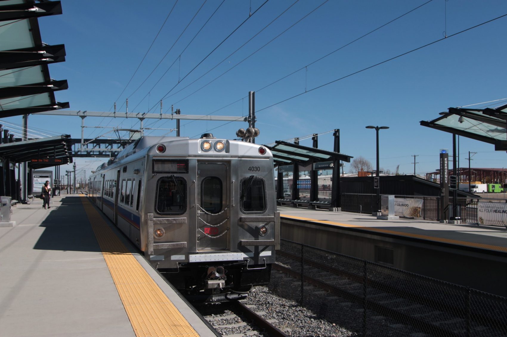 A train arrives at 38th &amp; Blake Station in the Five Points neighborhood of Denver. (Dean Russell/Here &amp; Now)