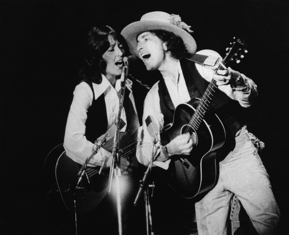 Joan Baez performing with Bob Dylan at the Rolling Thunder Revue in November 1975 in Providence, Rhode Island. (AP)
