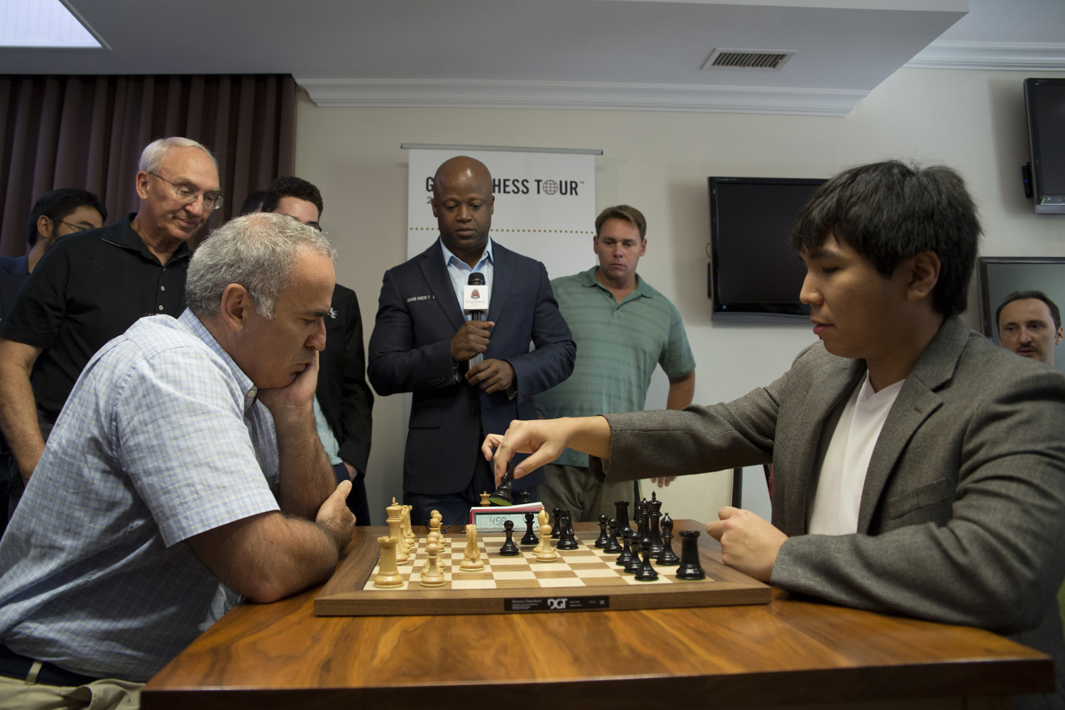 Grandmaster chess legend Garry Kasparov, left, competes against Grandmaster and 2016 Sinquefield Cup Champion Wesley So, right, during the Sinquefield Cup Chess Tournament's Ultimate Moves exhibition match. (Nick Schnelle/AP))