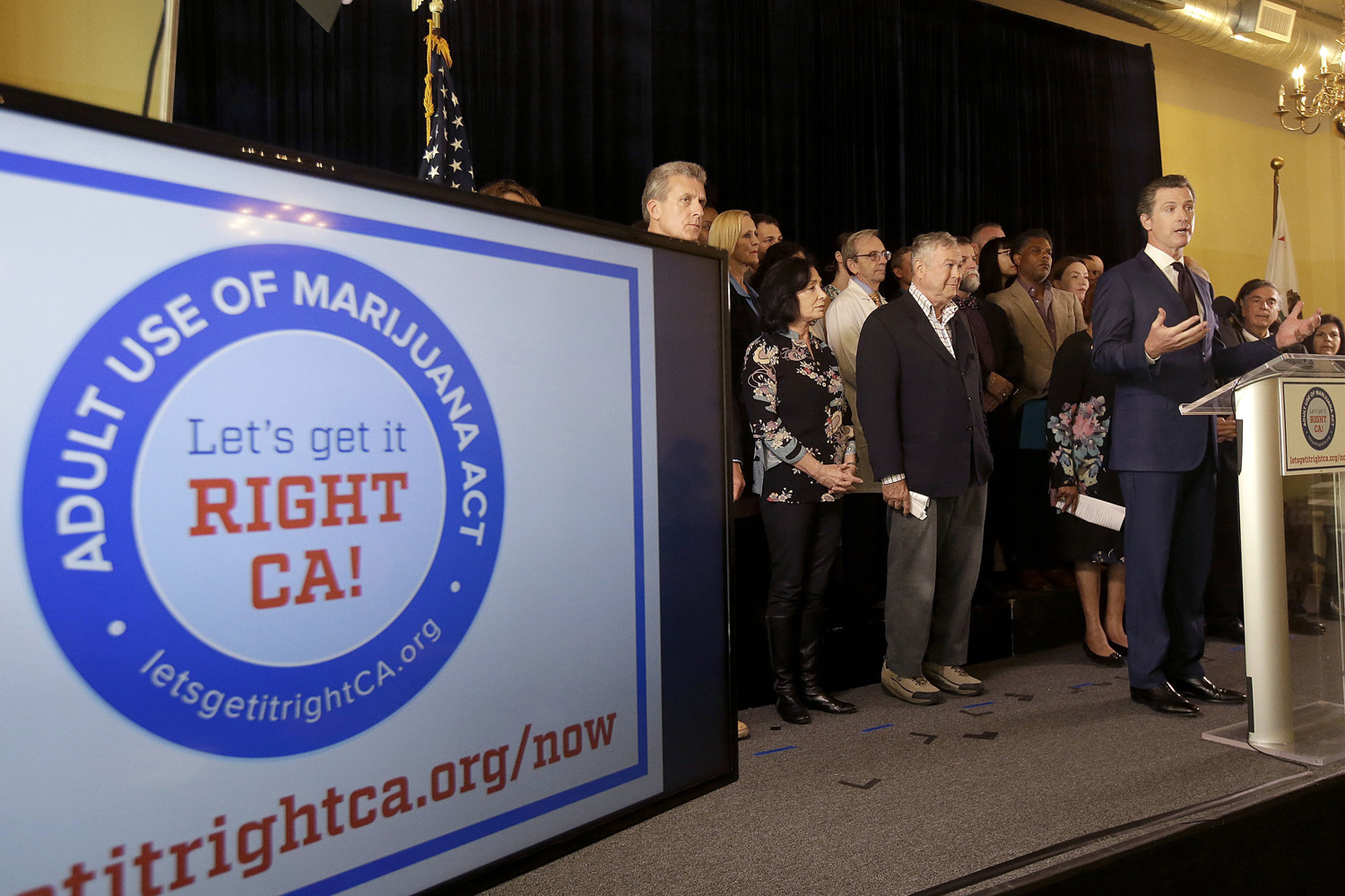 In this May 4, 2016 file photo, California Lt. Gov. Gavin Newsom, right, speaks in support of the Adult Use of Marijuana Act ballot measure in San Francisco.(Jeff Chiu/AP)