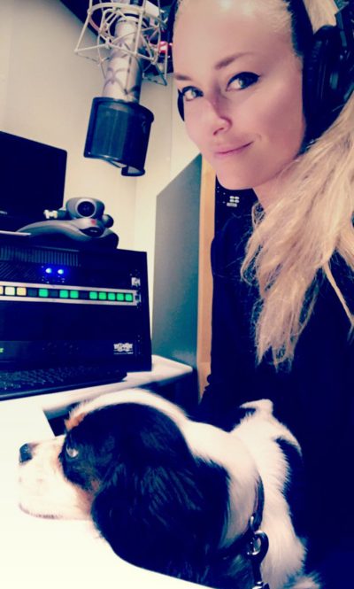 Olympian and author Lindsey Vonn, in the studios at NPR West in Culver City with her dog, Lucy. (Via Twitter)