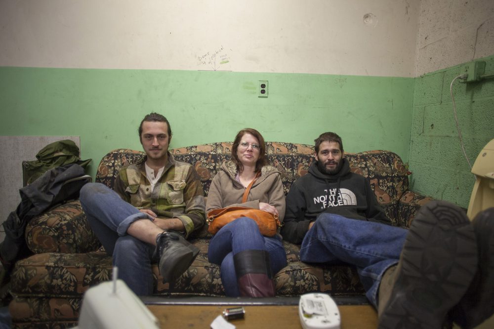 From left to right: Tristan Sutherland, Meredith Mahnke and Kent Flowers. Mahnke and Flowers founded the Worcester Free Store. (Joe Difazio for WBUR.)
