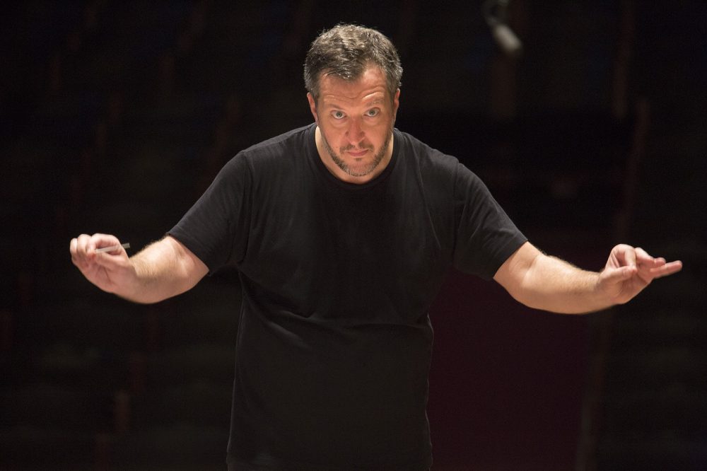 Thomas Adès, the Boston Symphony Orchestra's first artistic partner, conducts the BSO during a rehearsal at Symphony Hall. (Jesse Costa/WBUR)