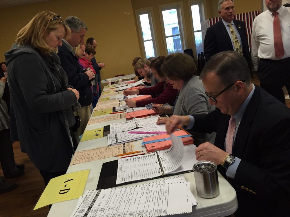 Voter turnout was heavy in Concord's Ward 7, where a line of more than 150 people awaited poll workers when they opened the location for voting. (Michael Brindley/NHPR)