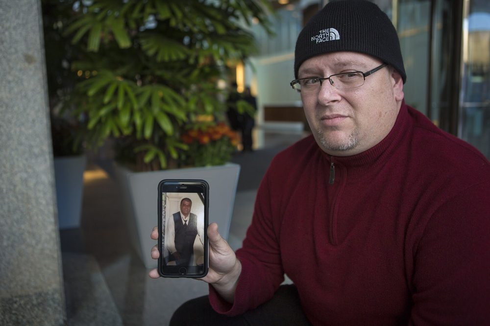 Anthony Salemi showing a photo of his brother Joe who overdosed on fentanyl earlier this year. (Jesse Costa/WBUR)