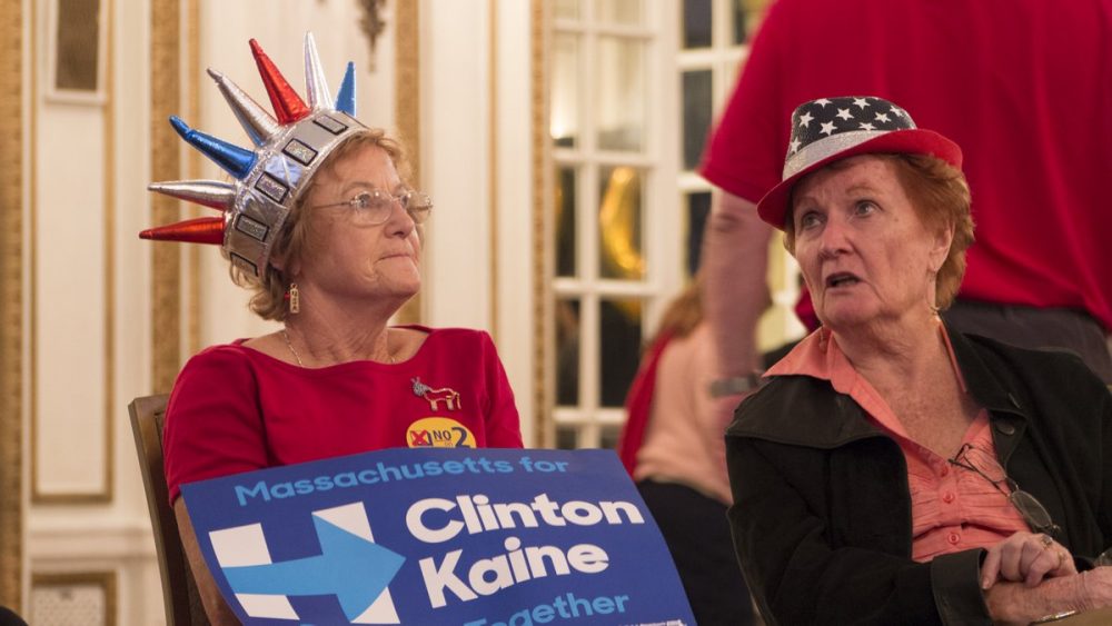 At a joint watch party for Clinton and those against the Massachusetts ballot question to raise the cap on charter schools, voters watched and waited. (Max Larkin/WBUR)