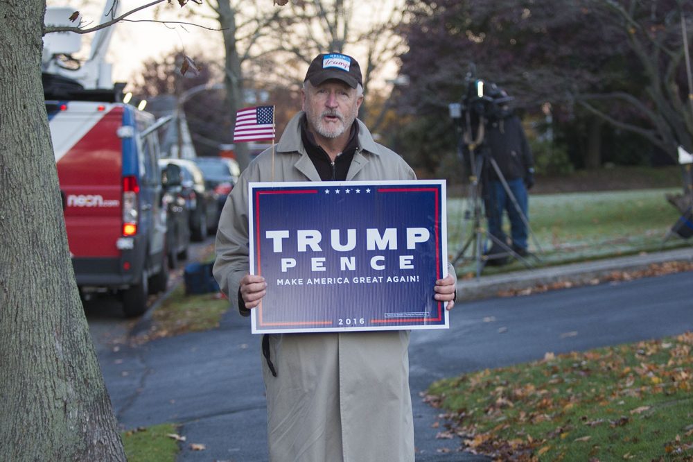 Clinton Guy, of Swampscott, came down to the First Church of Swampscott Congressional where voting was happening to show his support for Donald Trump. (Jesse Costa/WBUR)