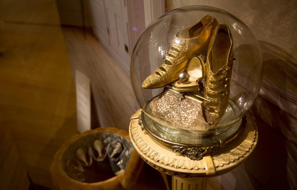 Early 20th century shoes, purse and ring from Raye's collection at the Peabody Essex Museum. (Robin Lubbock/WBUR)