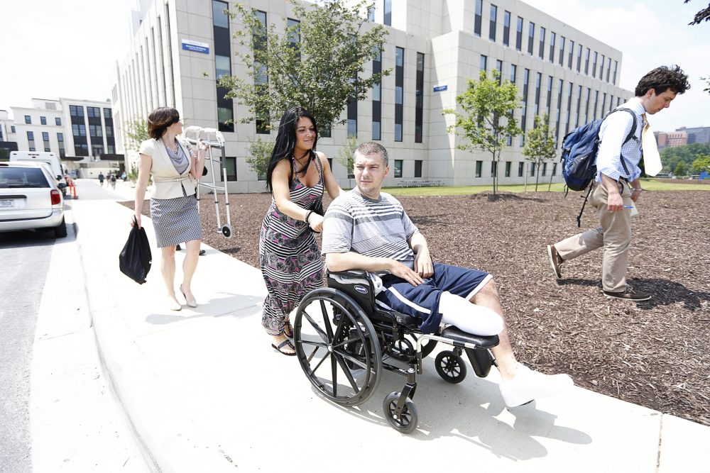 J.P. Norden visits Walter Reed National Military Medical Center in Bethesda, Maryland, with his doctors and prosthetist on June 12, 2013. (Courtesy Yoon S. Byun/Boston Globe/HBO)