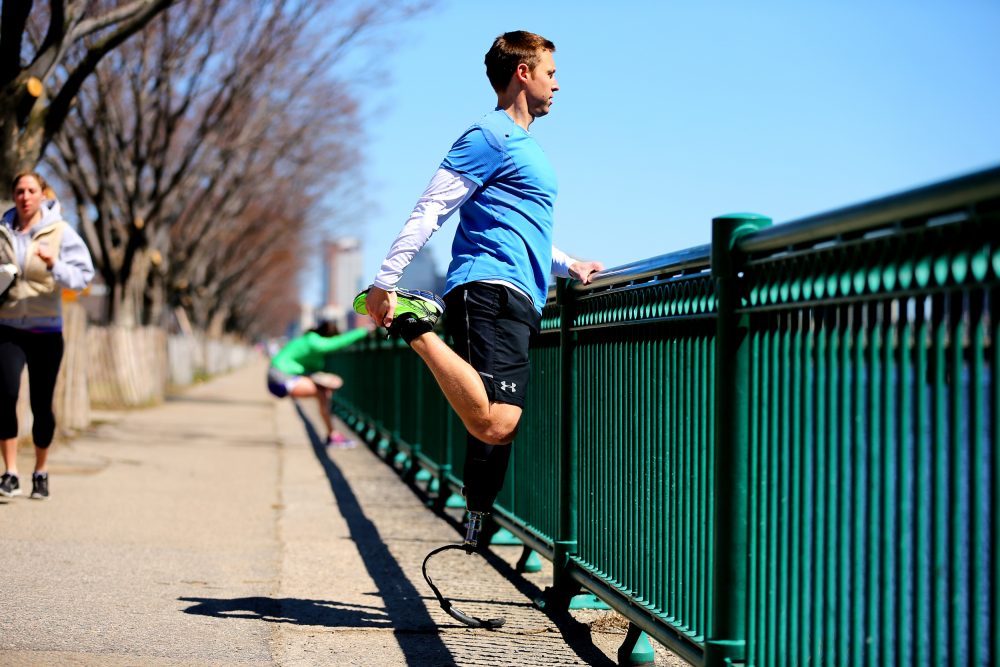 Patrick Downes trains in Cambridge to run the 2016 Boston Marathon on a running blade that is custom fit to his leg that was lost during the 2013 bombing. (Courtesy John Tlumacki/Boston Globe/HBO)