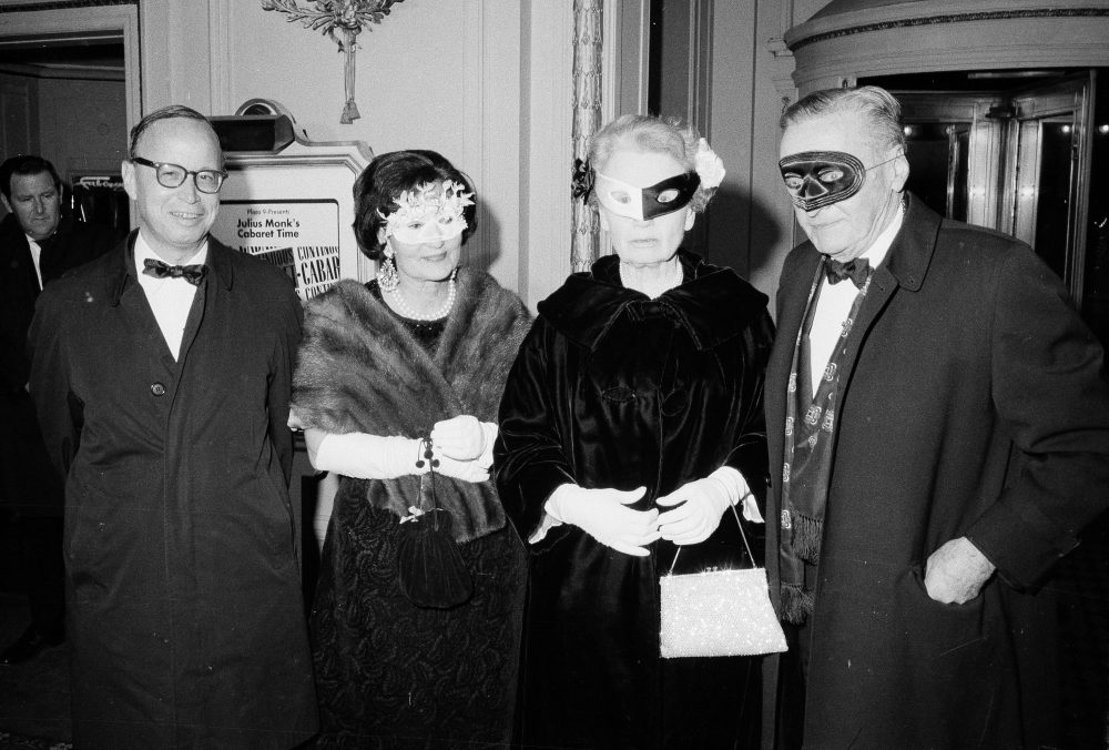 Historian and writer Arthur Schlesinger Jr., left, with his wife Marian join writer Walter Lippmann, at far right, and his wife Helen as they arrive at Truman Capote's Black and White Ball at New York City's Plaza Hotel at 59th Street and Fifth Avenue on Nov. 28, 1966. (AP)
