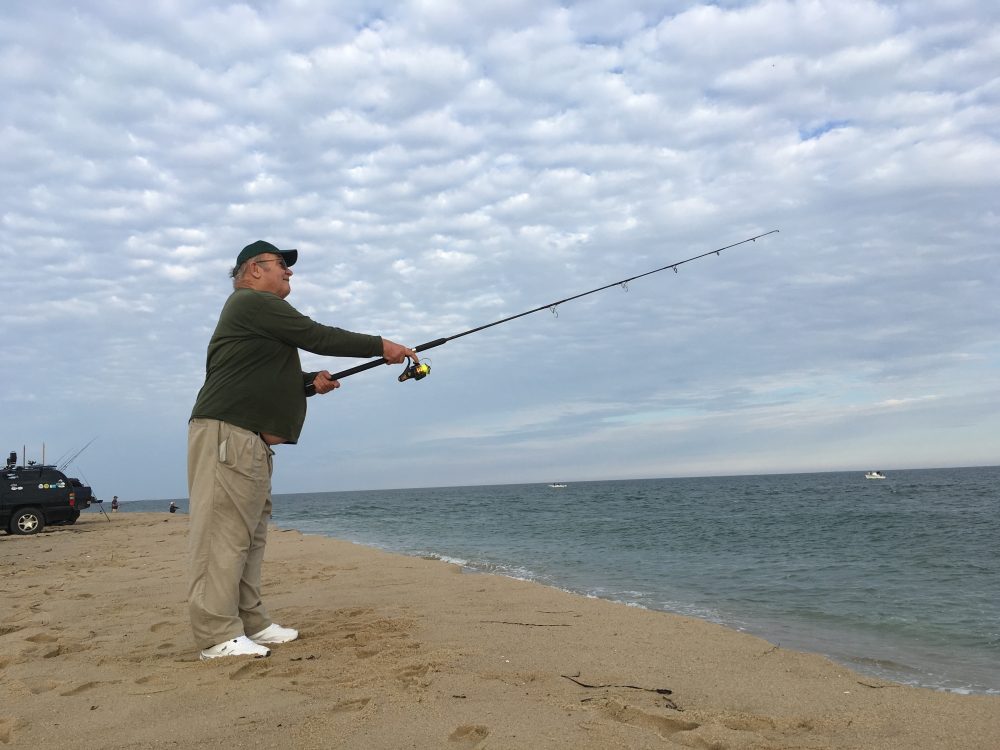 Paul Schultz surfcasting on Martha's Vineyard. (Robin Young/Here &amp; Now)