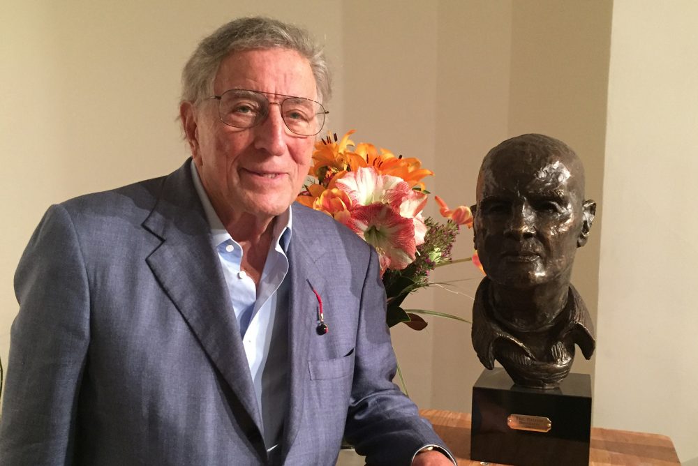 Tony Bennett with bust he sculpted of his friend Harry Belafonte. (Robin Young/Here &amp; Now)