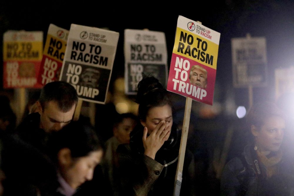 A woman holding a placard wipes away tears as she takes part in an anti-racism protest against President-elect Donald Trump winning the American election, outside the U.S. embassy in London, Wednesday, Nov. 9, 2016. Democratic presidential candidate Hillary Clinton conceded her defeat to Republican Donald Trump after the hard-fought presidential election. (Matt Dunham/AP)