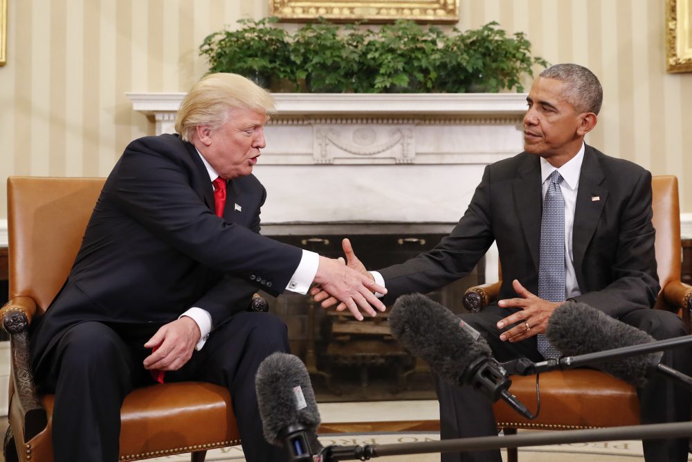 President Obama and President-elect Trump shake hands following their meeting in the Oval Office Thursday. (Pablo Martinez Monsivais/AP)