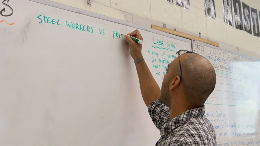 Darrell Anane teaches a class in U.S. history at Madison Park Vocational High School. (Tonya Mosley/WBUR)