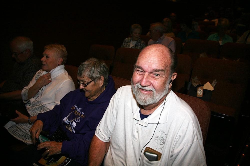 Tom Belson (with his wife Ruth) loved theater long before he lost his sight 40 years ago. He says some few theaters get the importance of audio description. (Stina Sieg/KJZZ)