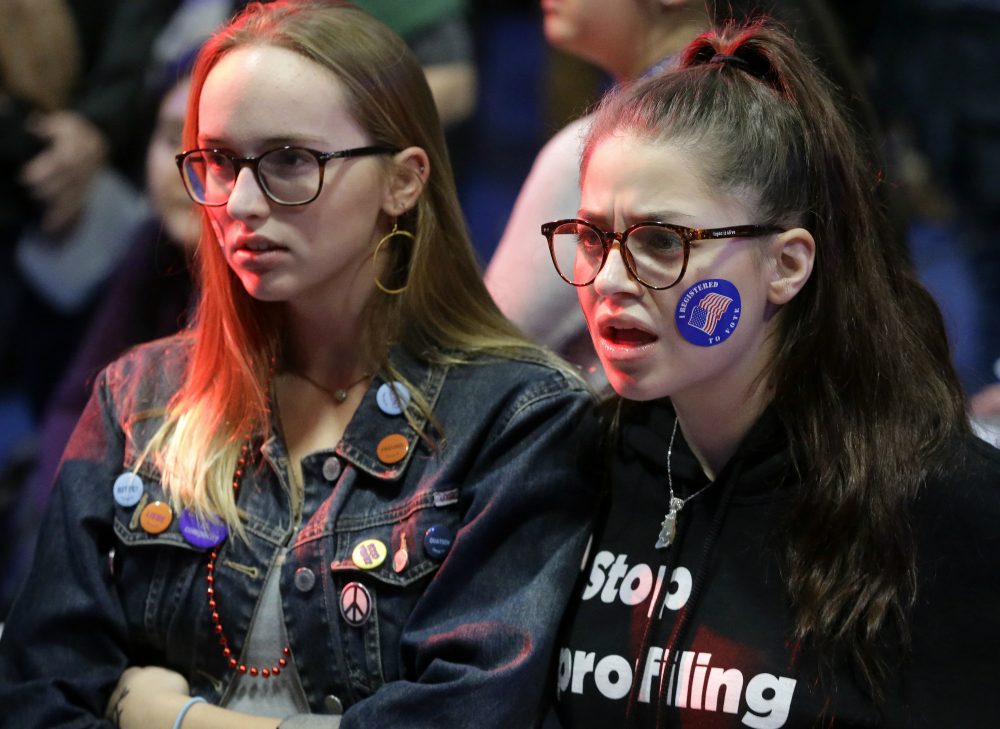 Emma Finnamore, of Maplewood, N.J., left, and Rayah Naji, of Boston, right, react while watching televised election returns Tuesday, Nov. 8, 2016 during a watch party at Wellesley College. (Steven Senne/AP)