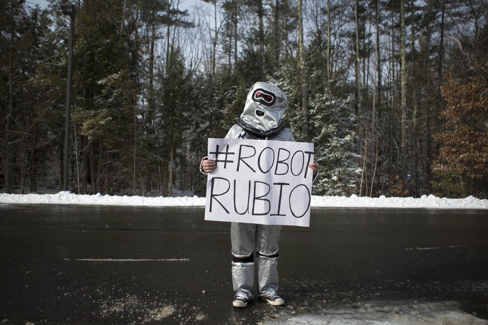 Aaron Black is up visiting friends from DC and is having some fun with Marco Rubio, dressing up at &quot;Robot Rubio.&quot; (Jesse Costa/WBUR)