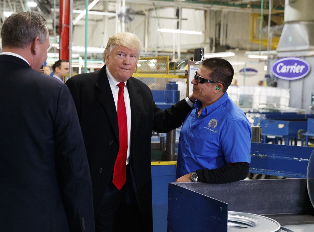 President-elect Donald Trump talks with workers during a visit to the Carrier factory, Thursday, Dec. 1, 2016, in Indianapolis, Ind. (Evan Vucci/AP)