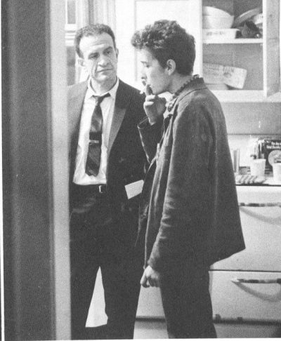 Manny Greenhill, manager for many of the Cambridge folk acts, with Bob Dylan at an apartment in Harvard Square. (Courtesy Betsy Siggins)