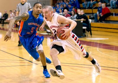 Jack Taylor drives to the hoop in a 2013 game against Crossroads College. (Justin Hayworth/AP)