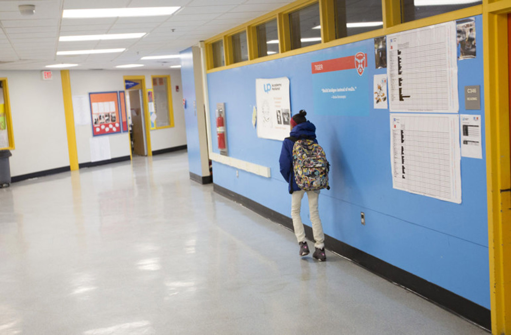 A student heads to class at UP Academy Holland. (Joe Difazio for WBUR)