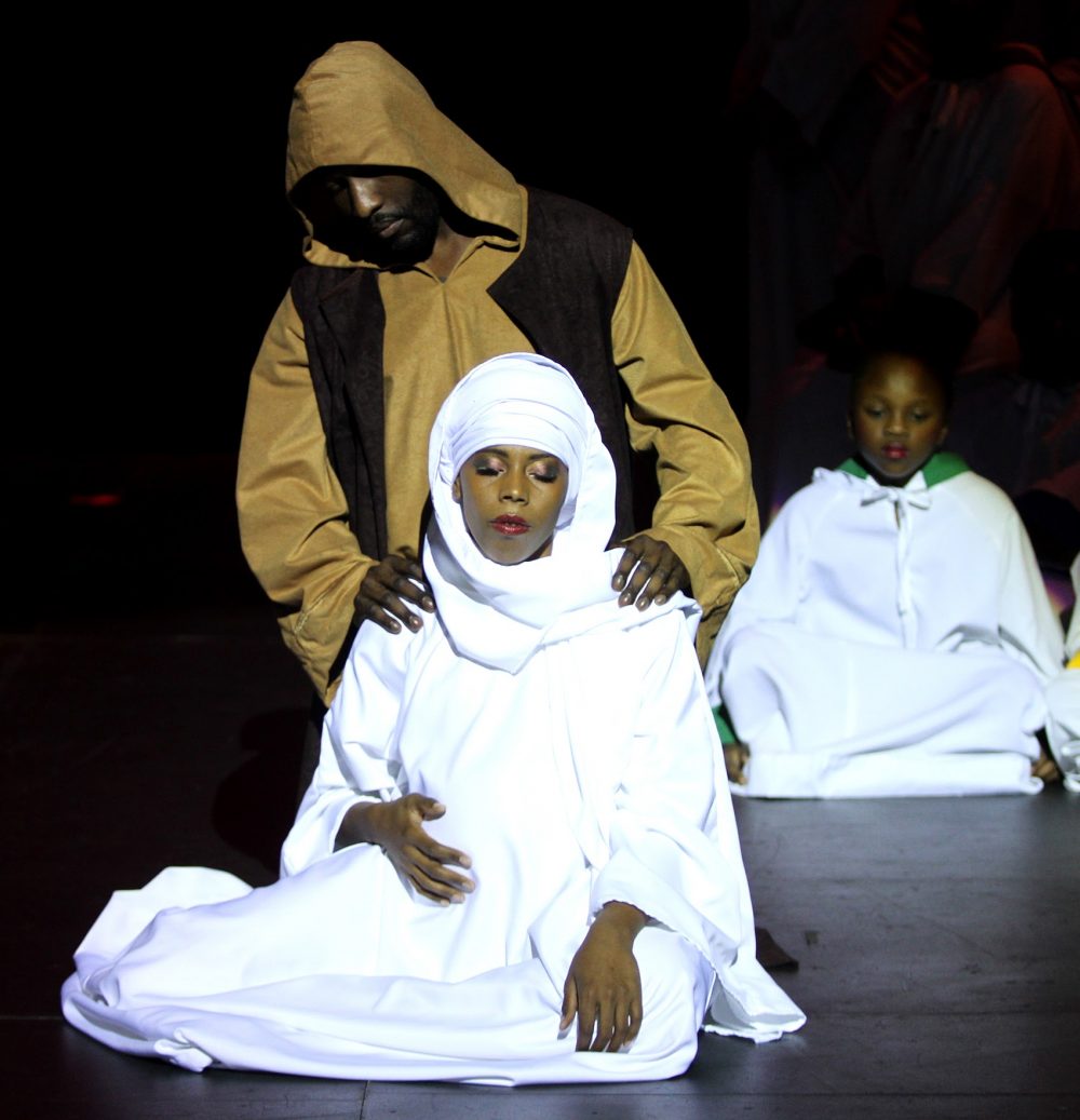 Mary and Joseph on stage early in the production. (Hadley Green for WBUR)