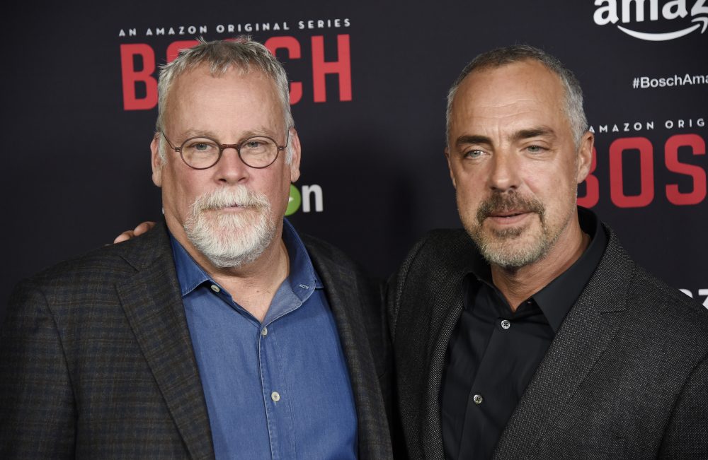 Titus Welliver, right, poses with Michael Connelly at the season two premiere of Amazon's &quot;Bosch.&quot; (Chris Pizzello/Invision/AP)