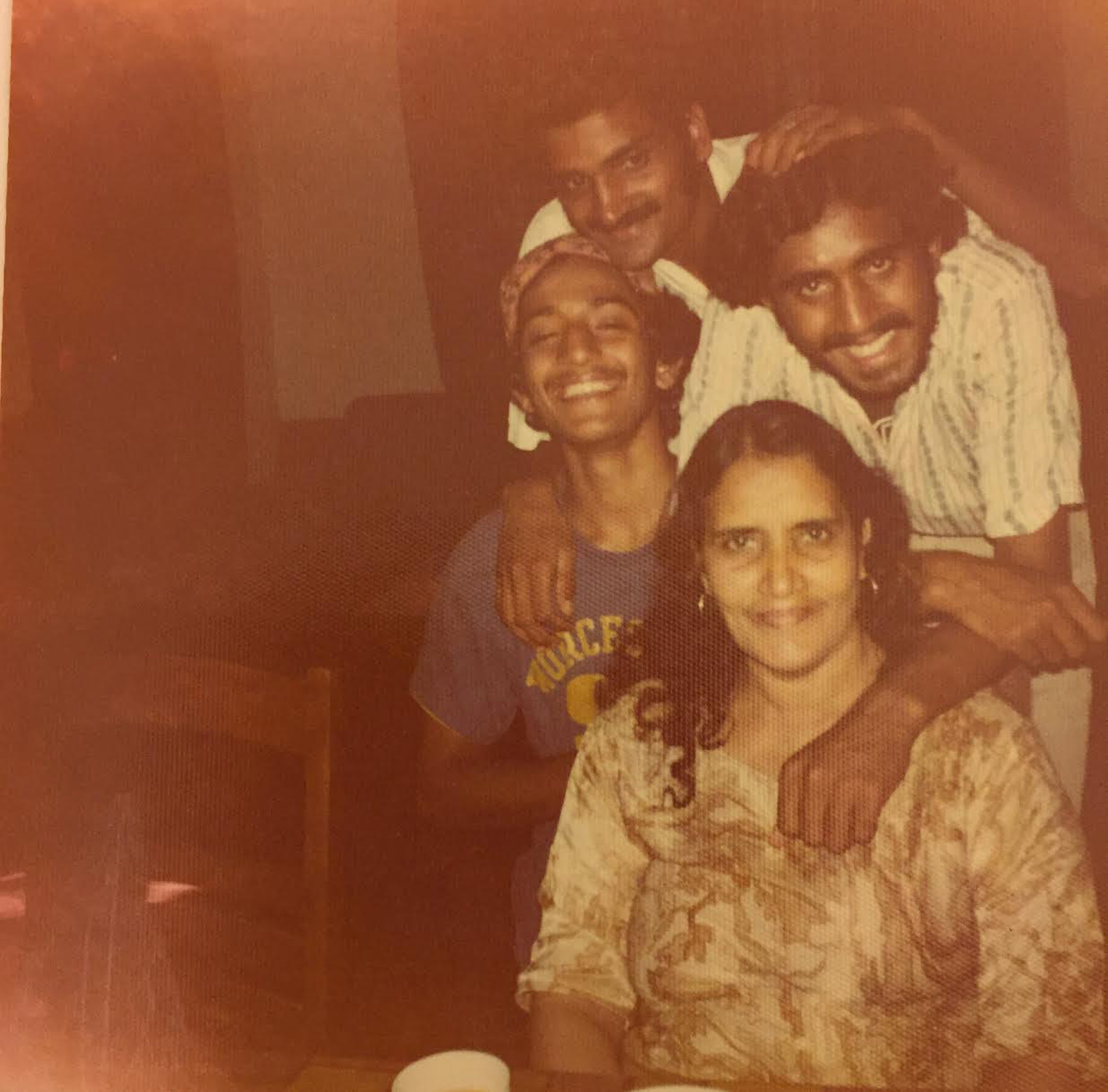 Amtul Hafeez with three of her six sons, from left, Uzair Rashid, Scunder Rashid and Munshoor Rashid (Courtesy Jumhoor Rashid)