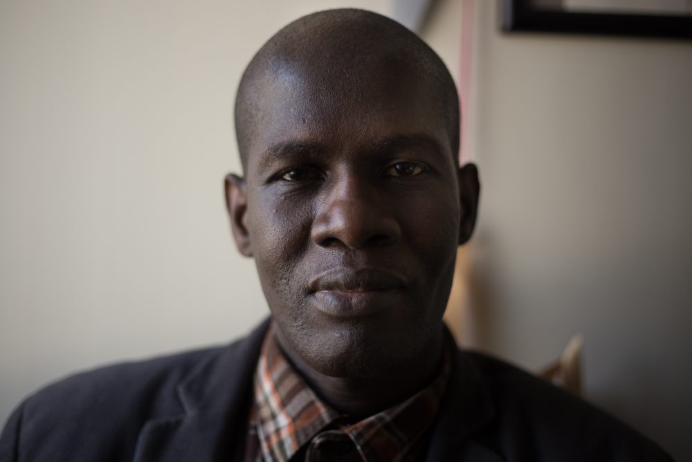 Amadou Hamady heads up Manchester's refugee resettlement program. (Ryan Caron King/NENC)