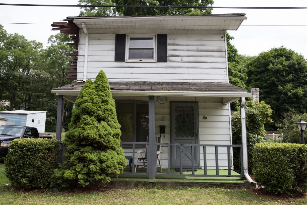 The home where Harold Israel and and his wife Olive lived with their two sons in Gilberton, Pa. (Half of the duplex was torn down in recent years.) (Ryan Caron King for WBUR)