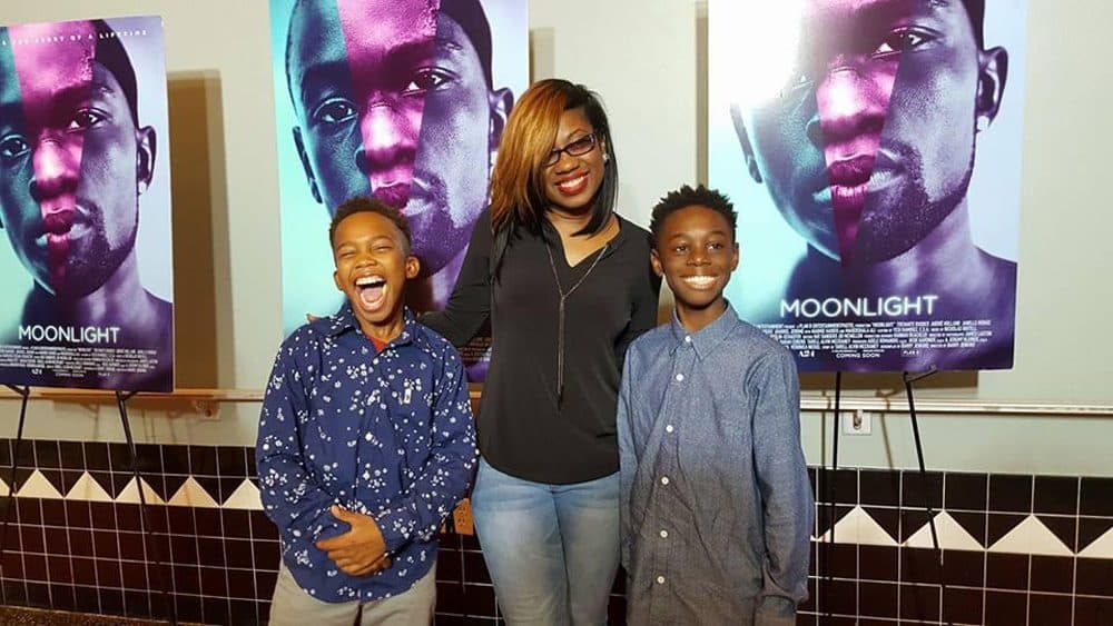 Tanisha Cidel, drama teacher at Norland Middle, with her students Jaden Piner (left) and Alex Hibbert (right) who star in the movie Moonlight. (Courtesy Natalie Piner via WLRN)