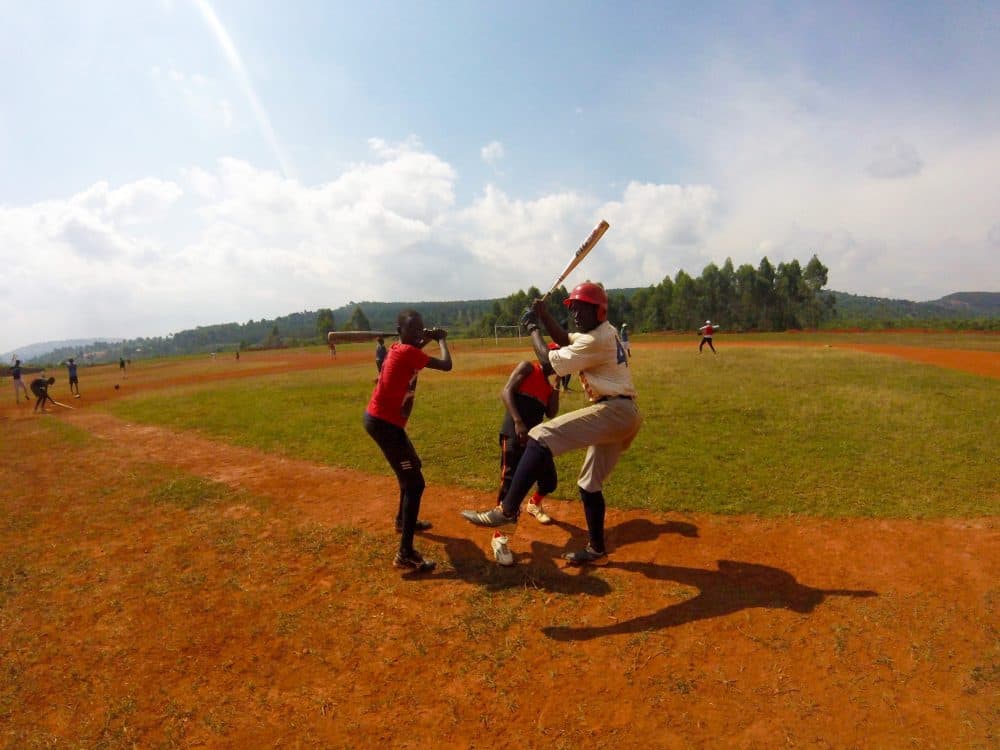 Kids from the Allen VR Stanley Secondary School of Math and Science for the Athletically Talented near Kampala, Uganda on the baseball field. (Courtesy Evan Petty)