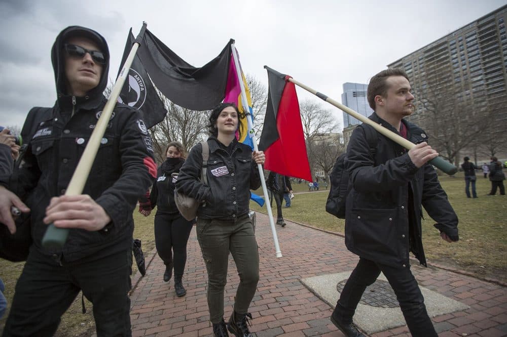 The local chapter of Anti-Fascist International arrive at Boston Common Friday afternoon to protest the inauguration of Donald Trump. (Jesse Costa/WBUR)