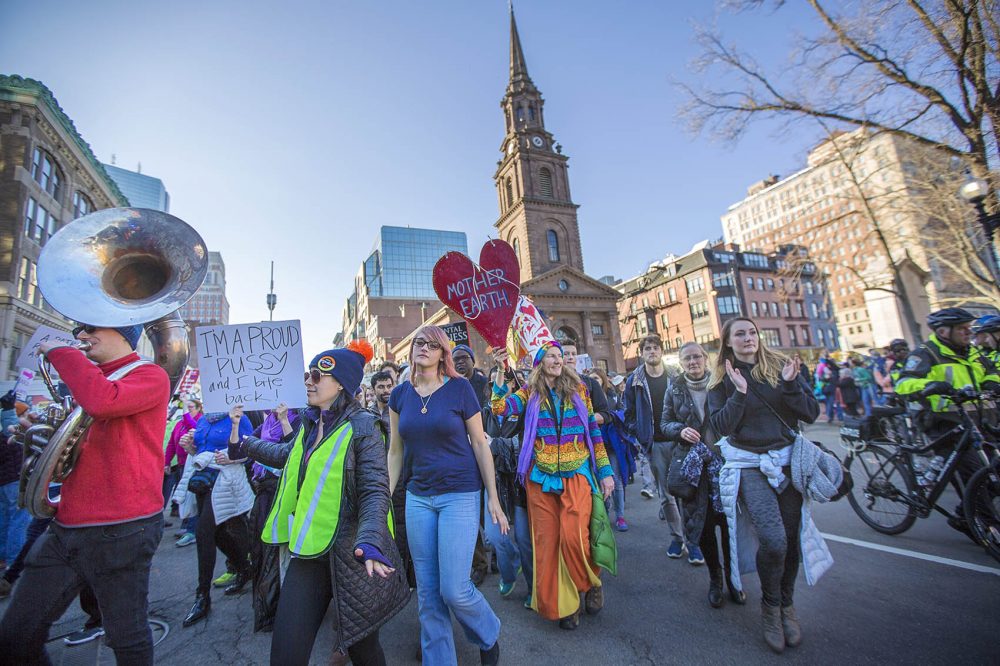 The Women's March in Boston passes the Arlington Street Church onto Boylston Street. (Jesse Costa/WBUR)