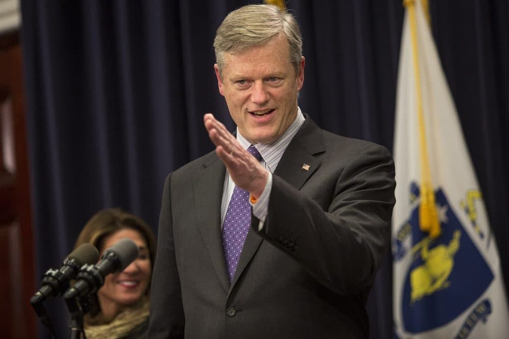 Gov. Charlie Baker fields questions from the media after announcing his budget proposal on Wednesday. (Jesse Costa/WBUR)