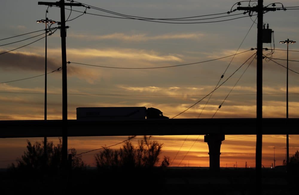 In this Monday, Nov. 21, 2016 photo, a truck travels on an overpass towards the World Trade Bridge, in Laredo, Texas. Donald Trump’s campaign promise to abandon the North American Free Trade Agreement is unnerving to many people in cities on the U.S.-Mexico border. Communities such as Laredo and El Paso in Texas or Nogales in Arizona have boomed under the 1994 treaty. (Eric Gay/AP)