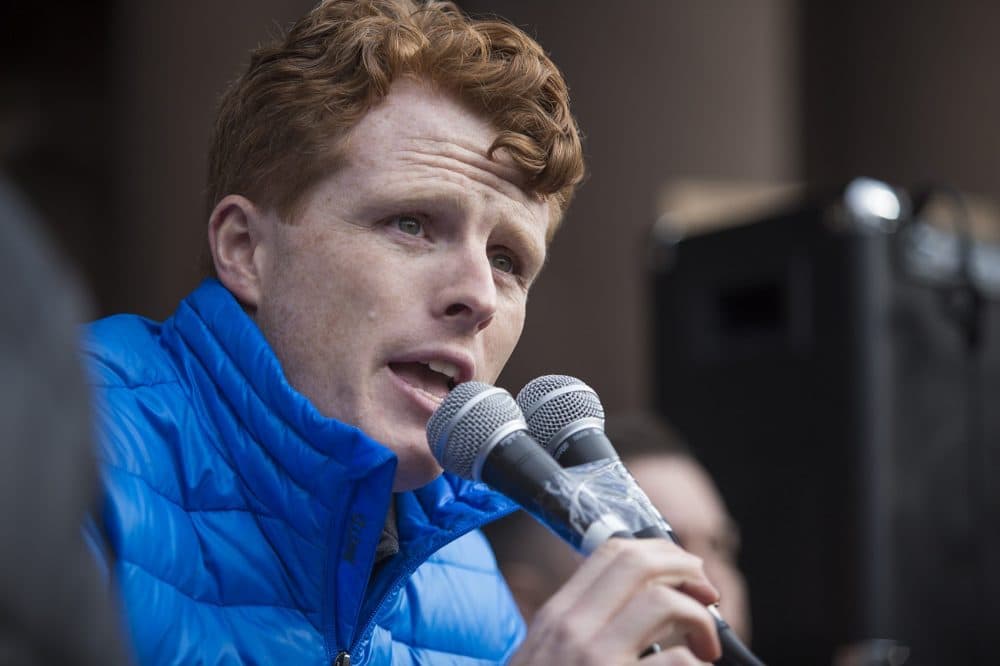 &quot;Watching the events of what's happened to this country over the past 36 hours, I think, like a lot of people here, I felt sick to my stomach,&quot; Rep. Joseph Kennedy III said to the crowd. (Jesse Costa/WBUR)