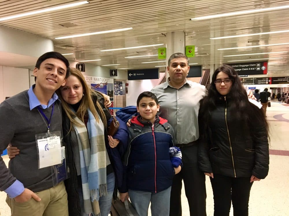 Daniel and his family were reunited after 16 years. (Shannon Dooling/WBUR)