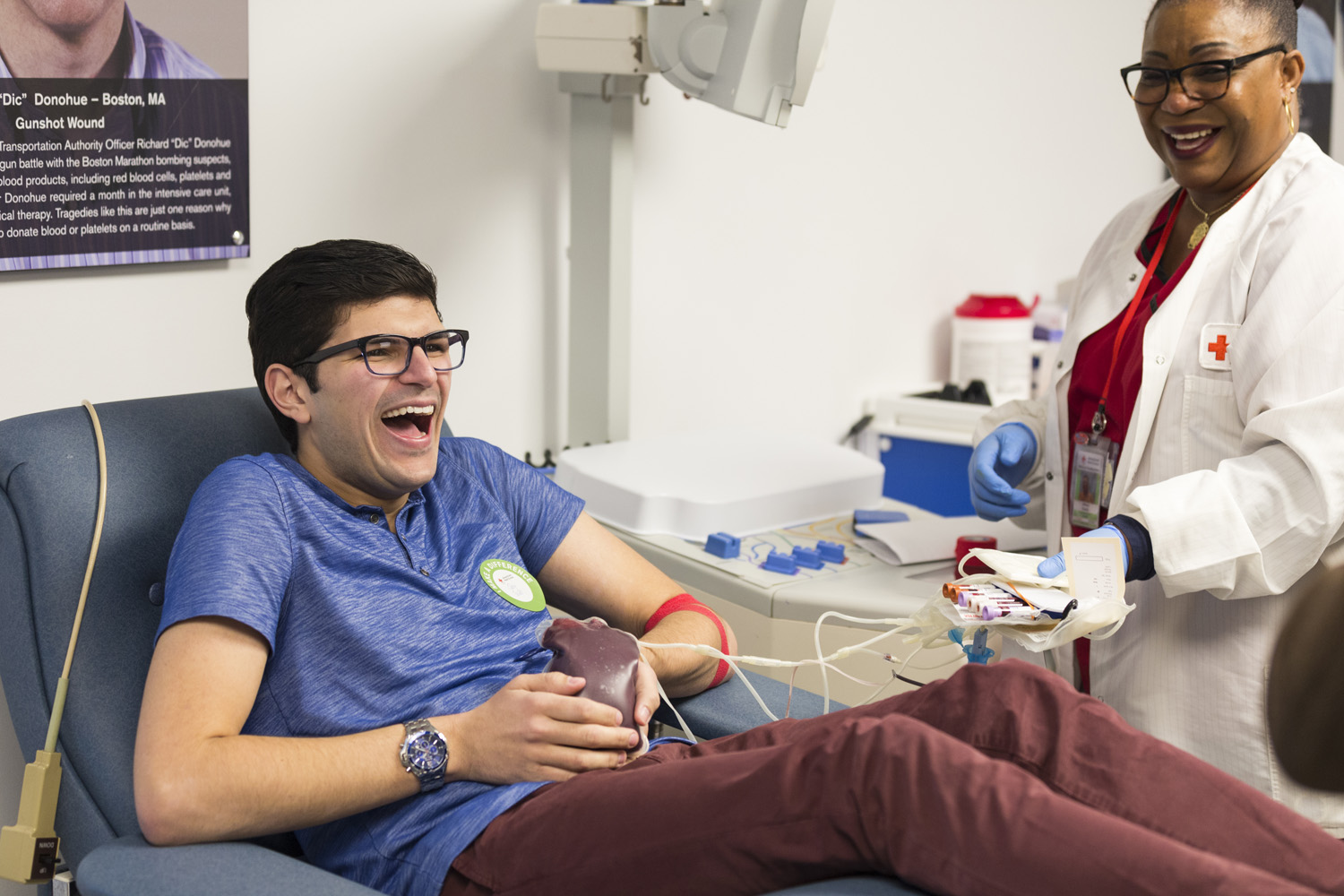 Jay Franzone laughs as he donates blood in Washington, D.C. (Tamzin B. Smith Portrait Photography)