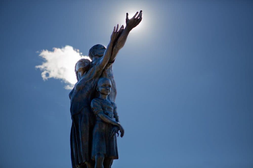 The 19-foot bronze sculpture stands at the gateway to Mattapan Square on Blue Hill Avenue in Boston. (Jesse Costa/WBUR)