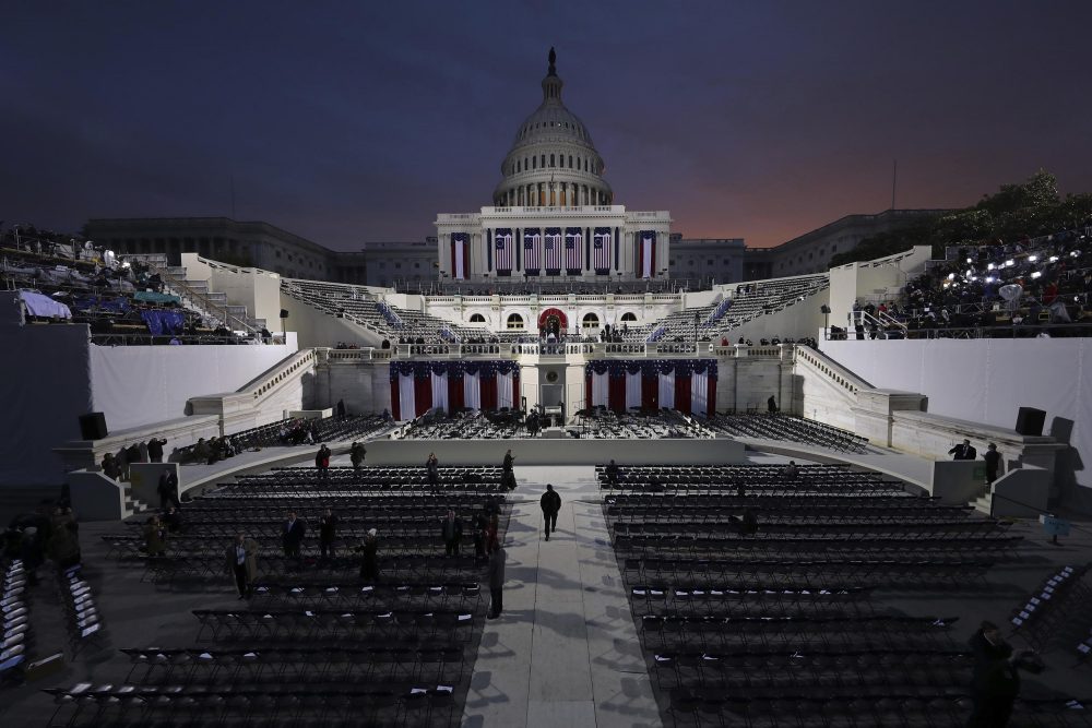 The sun begins to rise behind the Capitol in Washington Friday,, hours before the presidential inauguration of Donald Trump. (Andrew Gombert/AP)