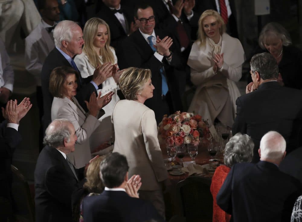 Hillary Clinton stands as she is recognized by President Trump during his speech at the inaugural luncheon at the Statuary Hall in the Capitol. (Manuel Balce Ceneta/AP)