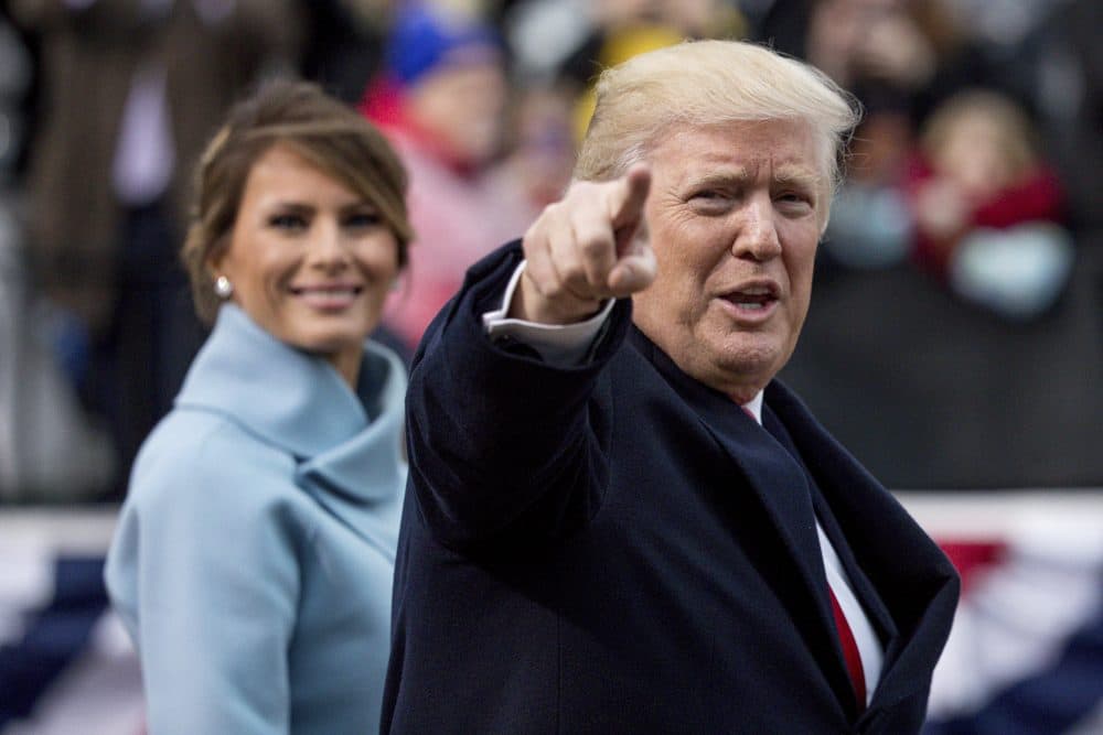 President Trump waves to the crowd during the inaugural parade. (Andrew Harnik/AP)