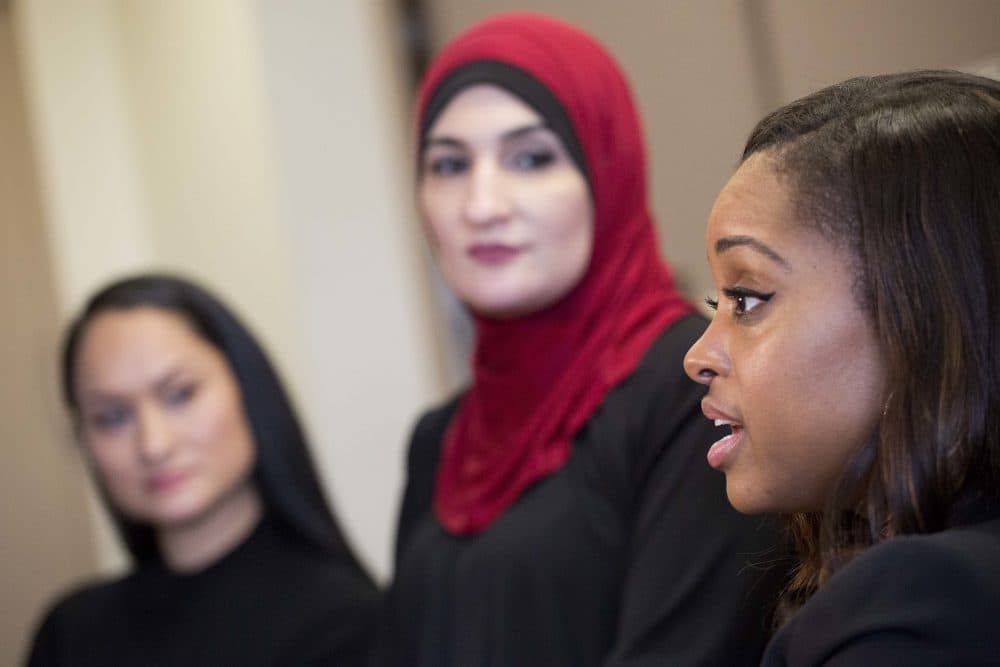 Tamika Mallory, right, co-chair of the Women's March on Washington, talks during an interview Jan. 9, 2017 with fellow co-chairs Carmen Perez, left, and Linda Sarsour, in New York. The march will be held Jan. 21, 2017, the day after Donald Trump's inauguration. (Mark Lennihan/AP)